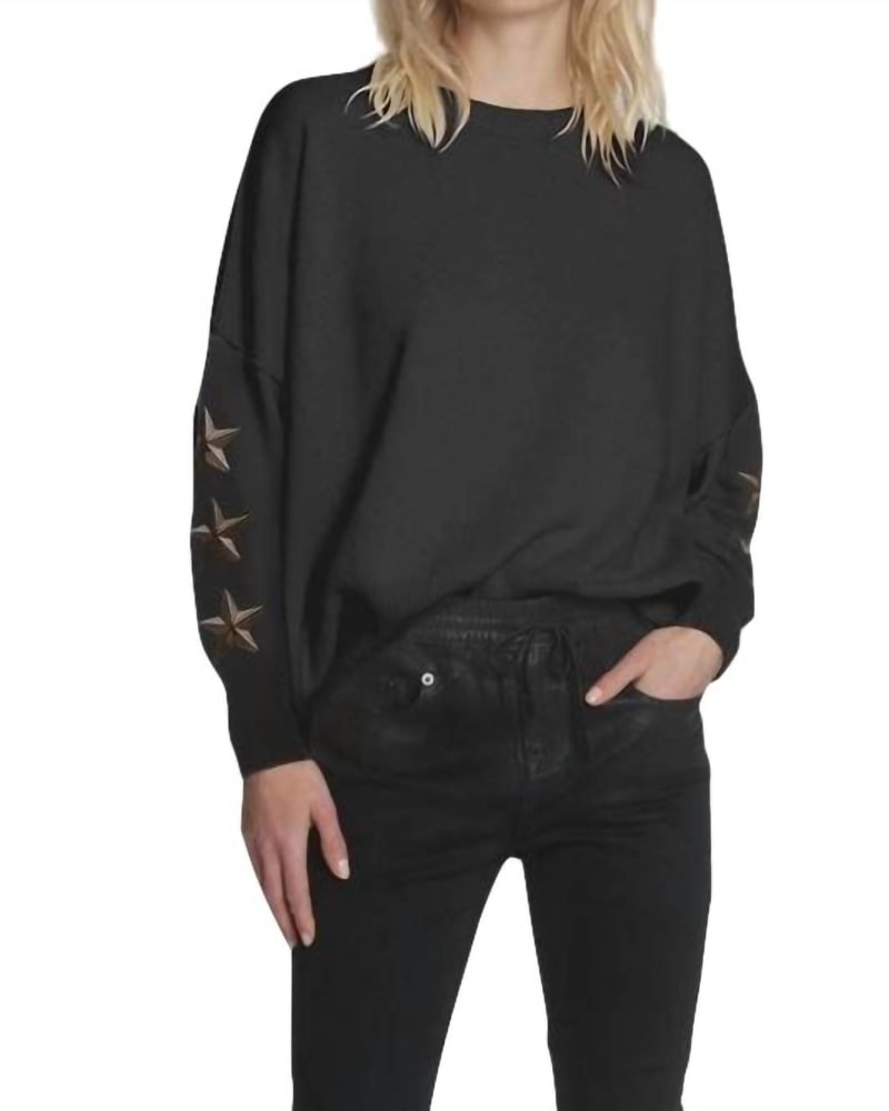 Front of a model wearing a size L Matchbox Sweatshirt in Black in Black by LABEL+thread. | dia_product_style_image_id:333682